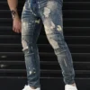 Jean bleu vintage déchiré à motif graffiti pour homme Jean bleu vintage déchiré à motif graffiti pour homme, pantalon en denim extensible slim de style urbain août 17, 2024 Kotazando