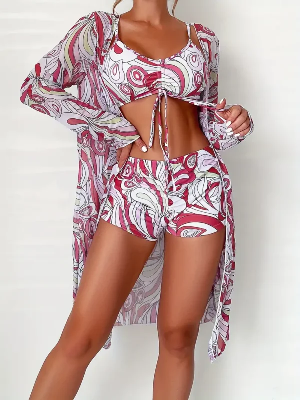 Ensemble de bikini 3 pièces à imprimé géométrique Ensemble de bikini 3 pièces à imprimé géométrique, bas de maillot de bain à col en V avec chemise de protection, maillot de bain à manches longues, maillots de bain et vêtements pour femmes 27 août 2024 Kotazando