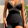 Maillot de bain une pièce noir à col en V Maillot de bain une pièce noir à col en V, dos nu avec boucle dans le dos, maillot de bain gainant pour le ventre, maillots de bain et vêtements pour femmes 27 août 2024 Kotazando