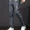 Jean skinny décontracté de style vintage pour homme Jean slim imprimé lettre pour homme, pantalon en denim décontracté pour adulte août 17, 2024 Kotazando