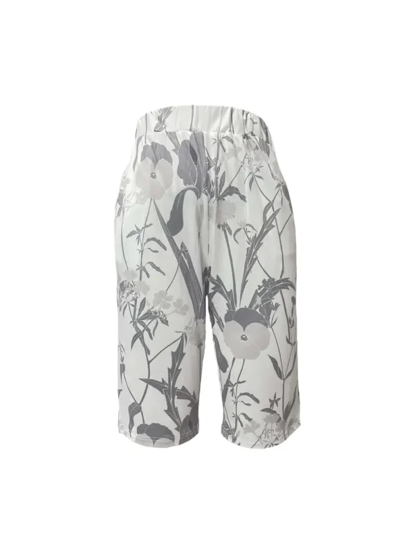 Short taille élastique à imprimé floral avec poche inclinée, short ample décontracté pour le printemps et l'été, vêtements pour femmes – Image 4