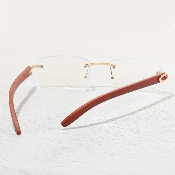 Mode homme Mode homme, Lunettes de vue sans monture en bois avec accents métalliques, Verres en PC à usage décoratif, Sans ordonnance 31 août 2024 Kotazando