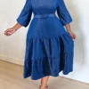 Robe manteau en jean maxi bleu délavé uni grande taille avec ceinture Robe en jean grande taille pour femmes, Style décontracté, longueur avec volants à plusieurs niveaux, manches 3/4, taille ceinturée à la mode septembre 13, 2024 Kotazando