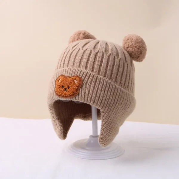 Bonnet d'hiver pour bébé Bonnet d'hiver pour bébé, bonnet tricoté avec protection des oreilles en forme d'ours de dessin animé pour tout-petits garçons et filles octobre 6, 2024 Kotazando