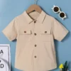 Chemise classique unie pour bébé garçon Chemise classique unie pour bébé garçon, haut respirant à manches courtes avec poche à rabat, parfait pour l'été en plein air 26 décembre 2024 Kotazando