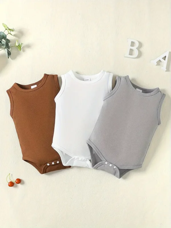 Body texturé gaufré 3 pièces pour bébé Body texturé gaufré 3 pièces pour bébé, combinaison sans manches de couleur unie, vêtements pour bébé garçon octobre 8, 2024 Kotazando