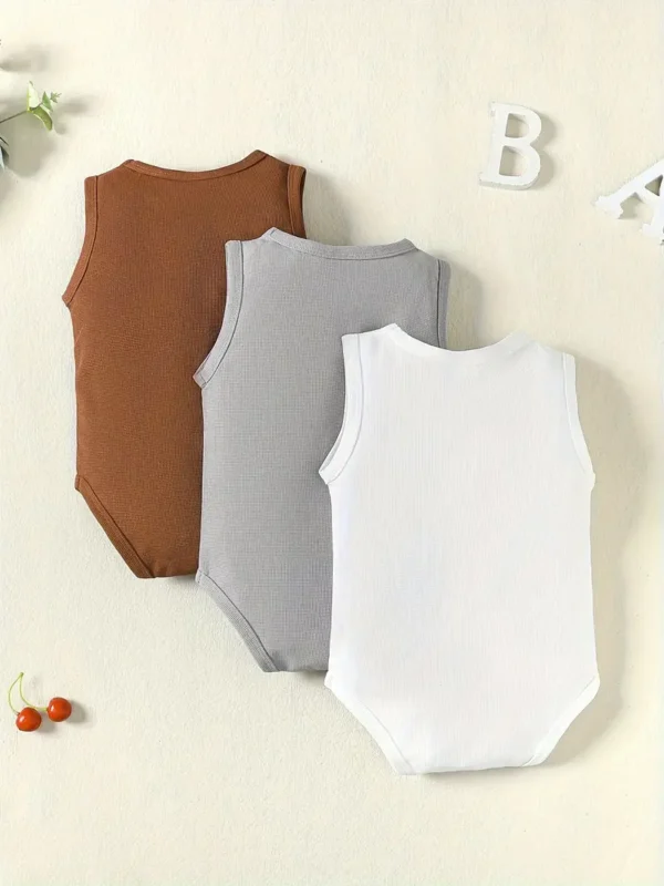 Body texturé gaufré 3 pièces pour bébé Body texturé gaufré 3 pièces pour bébé, combinaison sans manches de couleur unie, vêtements pour bébé garçon octobre 8, 2024 Kotazando