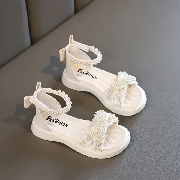 Sandales à bout ouvert tendance et mignonnes avec nœud en perles et décoration de couleur unie pour filles Sandales à bout ouvert tendance et mignonnes avec nœud en perles et décoration de couleur unie pour filles, sandales légères et respirantes pour les fêtes de fin d'année novembre 8, 2024 Kotazando