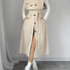 Ensemble élégant 2 en 1 trench coat et robe pour femme Ensemble élégant 2 en 1 trench coat et robe pour femme, Sans manches, détail boutonné avec ceinture et poches, lavable en machine 4 janvier 2025 Kotazando