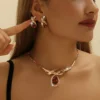 Ensemble de bijoux de naissance synthétique vintage bohème en alliage de zinc plaqué or 14 carats Parure de bijoux Claddagh plaquée or 14 carats avec éléments en verre de pierre de naissance d'octobre 6 janvier 2025 Kotazando